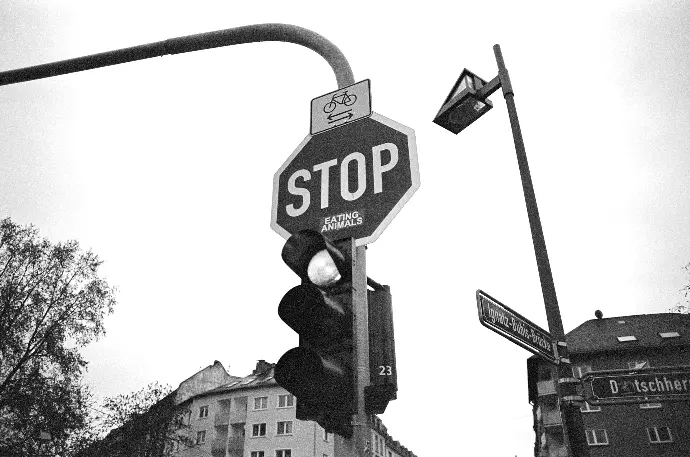 a black and white photo of a stop sign